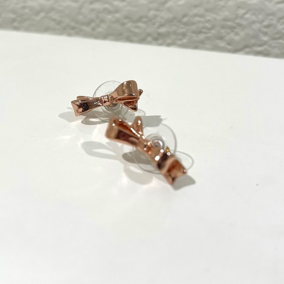 SOLD. Kate Spade New York Love Notes Rose Gold Color Metal Bow Stud Earrings